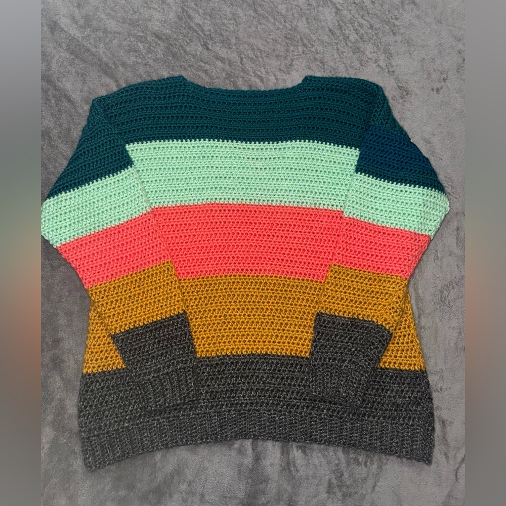 Handmade knit sweater
Size unknown appears to be a large